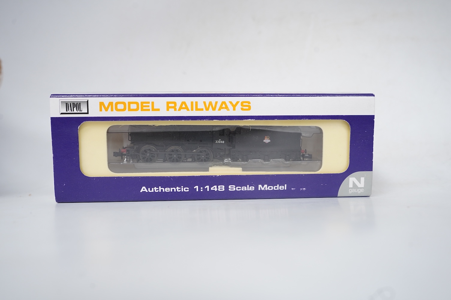 Four boxed Dapol N gauge railway locomotives; two BR Class Q1, both 33040 (ND-076B), one in associated box, a BR Class 14xx, 1458 (ND002) and an SR Class M7, 676 (ND-046). Condition - good.